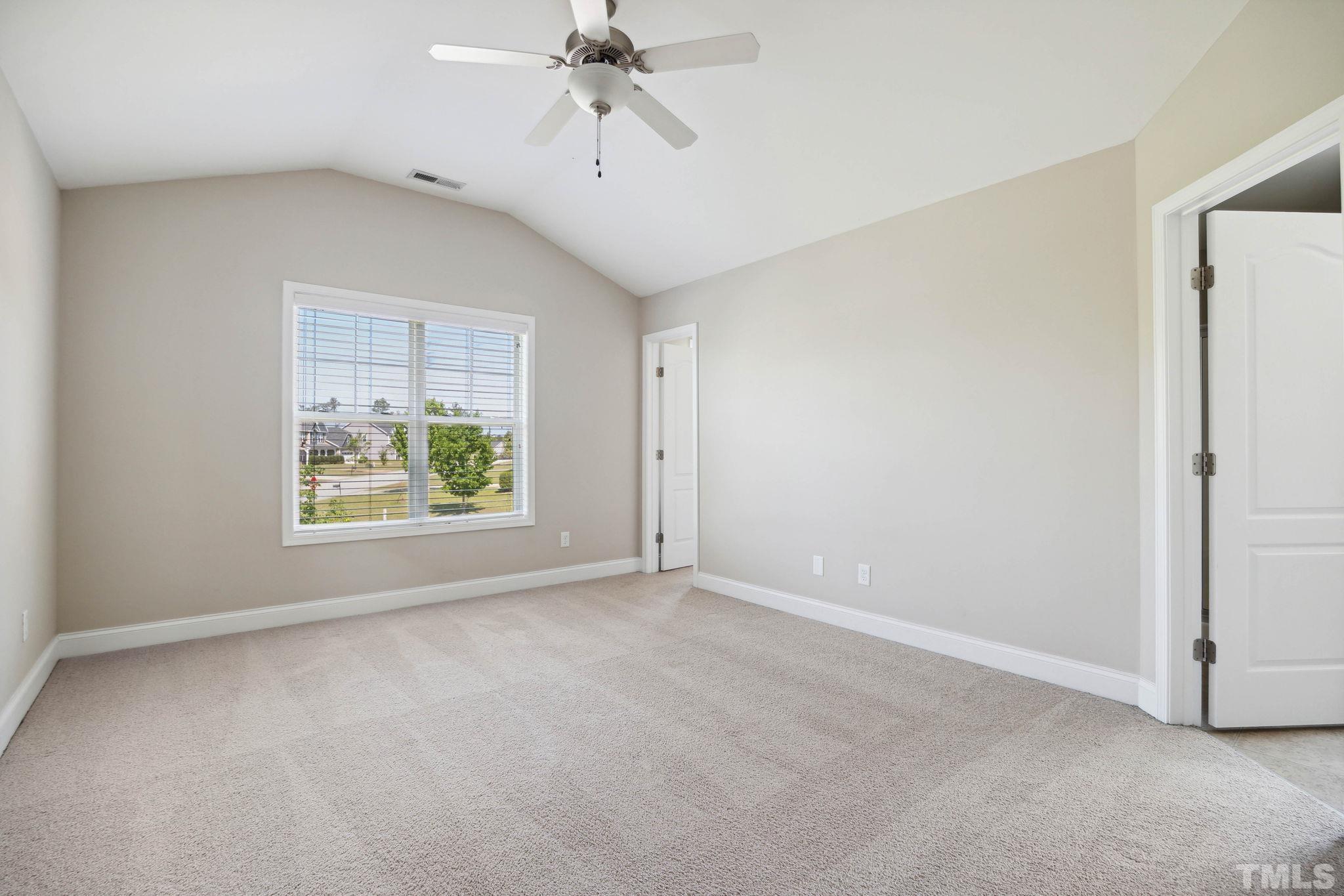 108 Riley Lane Cameron, NC 28326 - Photo 19 of 29 an empty room with windows and refrigerator