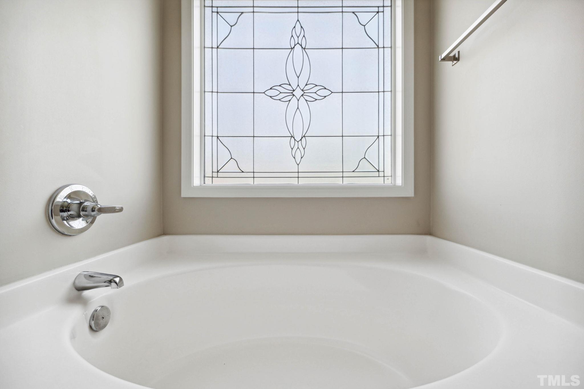 108 Riley Lane Cameron, NC 28326 - Photo 22 of 29 a bathroom with a tub and a window