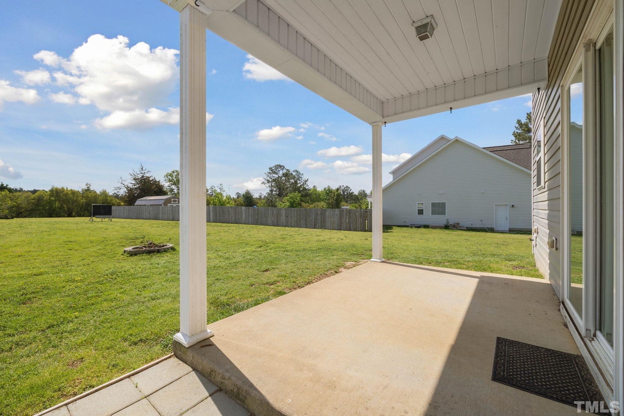 108 Riley Lane Cameron, NC 28326 - Photo 23 of 29 a view of a porch with a yard