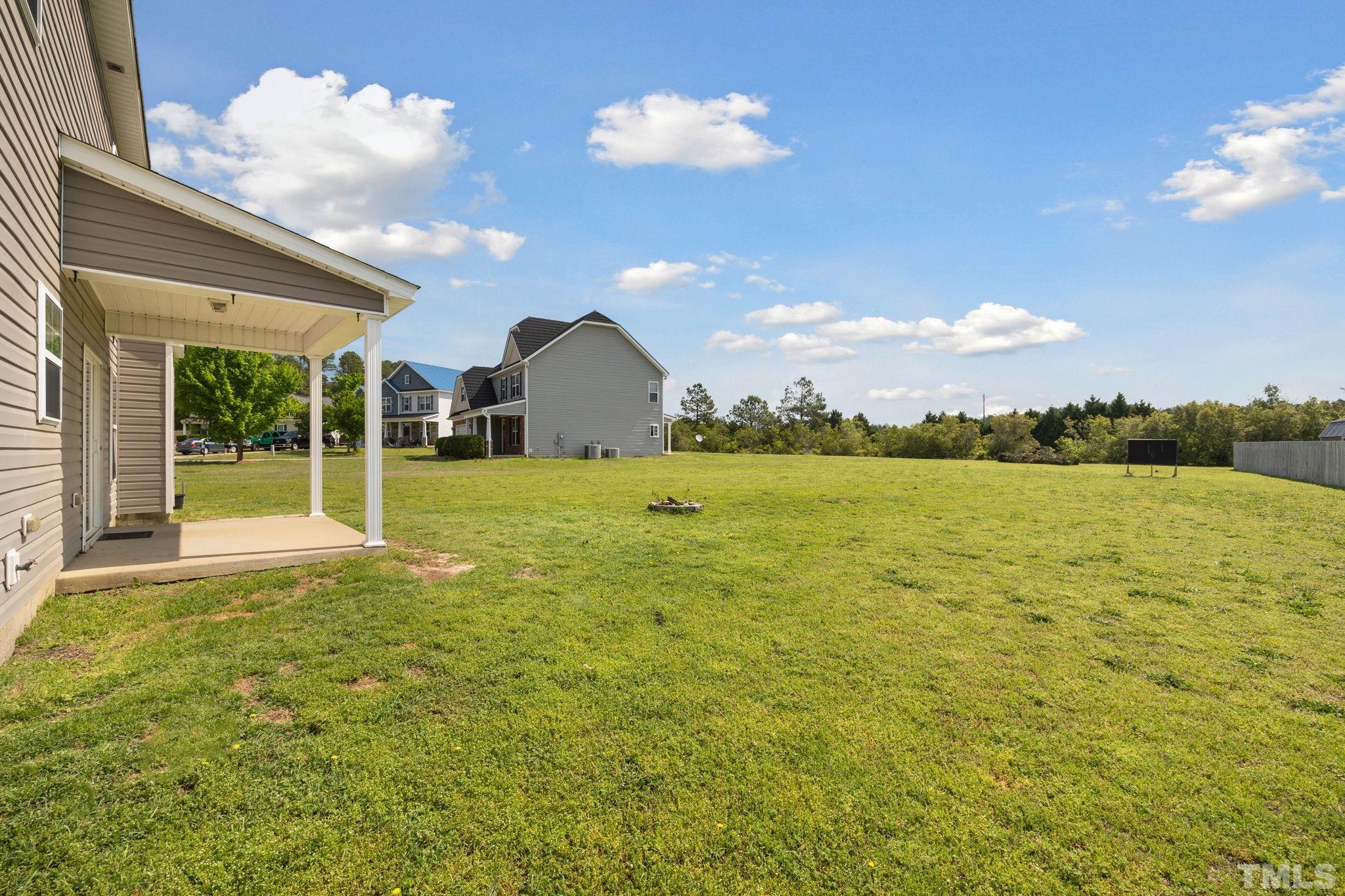 108 Riley Lane Cameron, NC 28326 - Photo 24 of 29 a view of a house with a big yard