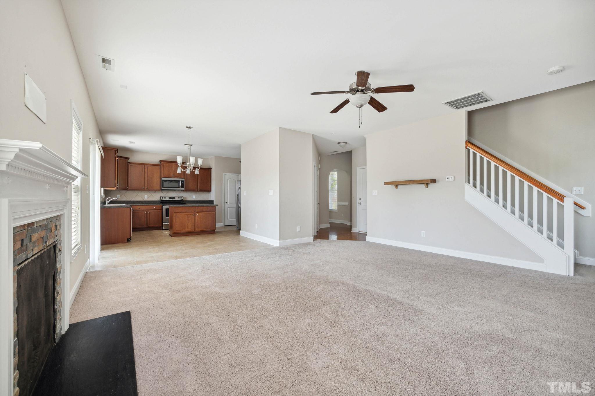 108 Riley Lane Cameron, NC 28326 - Photo 10 of 29 a view of a kitchen with furniture and a fireplace