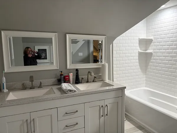 a bathroom with a sink and a bathtub