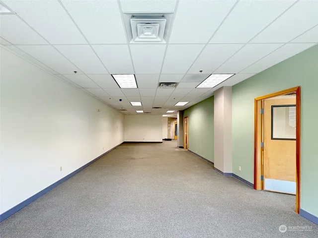a view of an empty room and window