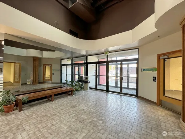 a view of a big room with closet and natural light