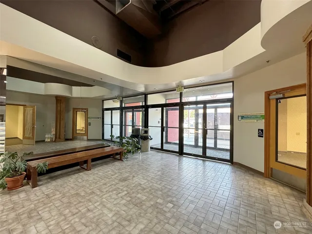 a view of a big room with closet and natural light