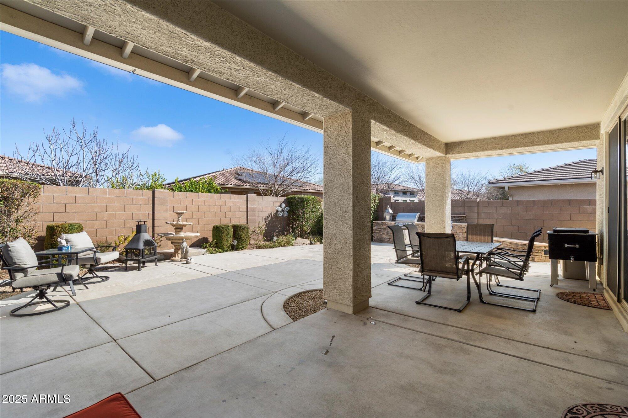 9010 West Ruth Avenue Peoria, AZ 85345 - Photo 22 of 26 a view of a chairs and tables in the patio