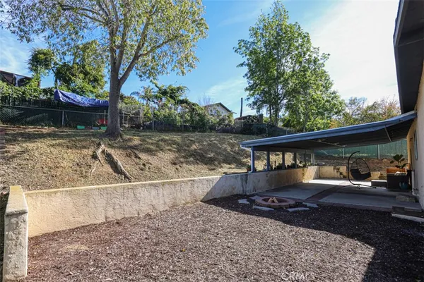 a view of house with outdoor space