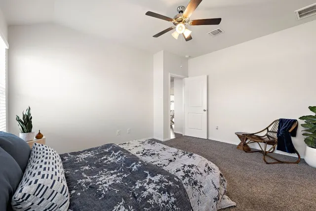 a bathroom with a double vanity sink mirror and double