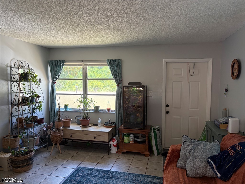 2175 Twin Brooks Road North Fort Myers, FL 33917 - Photo 6 of 27 a living room with furniture and a window