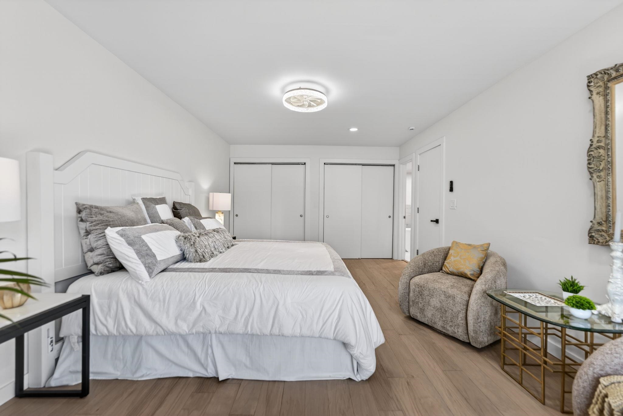 5075 Welsh Road Rockford, IL 61107 - Photo 28 of 54 a spacious bedroom with a bed and couch