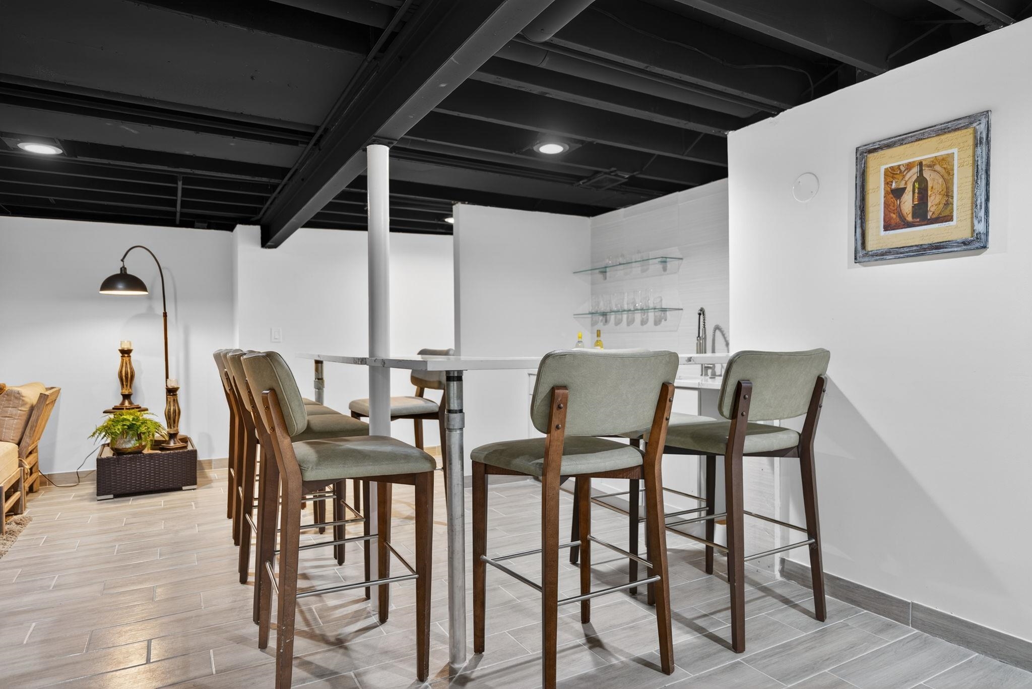 5075 Welsh Road Rockford, IL 61107 - Photo 38 of 54 a view of a dining room with furniture and a wooden floor