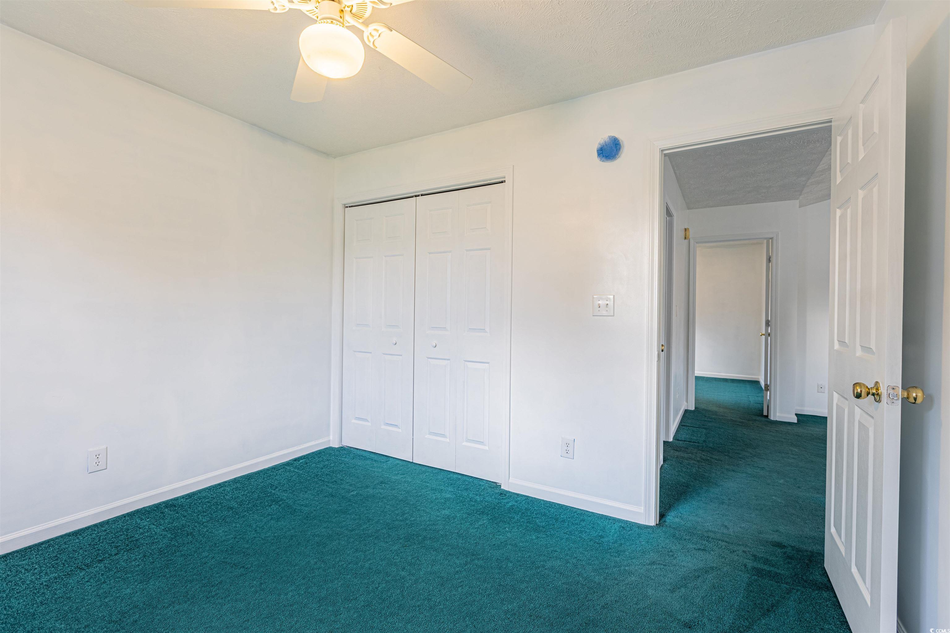 8089 Bark Court Murrells Inlet, SC 29576 - Photo 16 of 30 Unfurnished bedroom featuring ceiling fan, multipl