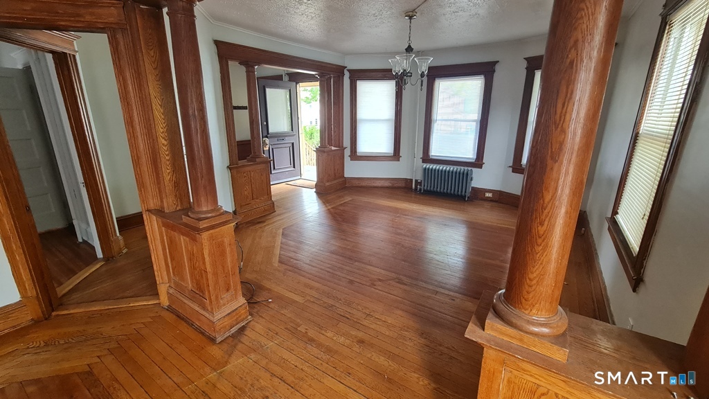 64-66 Ridge Street Manchester, CT 06040 - Photo 16 of 21 a view of an entryway with a hardwood