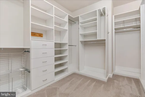 a view of an empty walk in closet