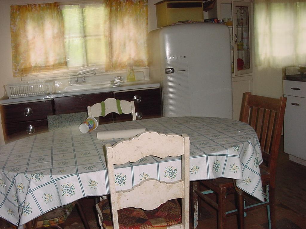 810 Westhill Road Effort, PA 18330 - Photo 3 of 4 a kitchen with a table chairs and a sink