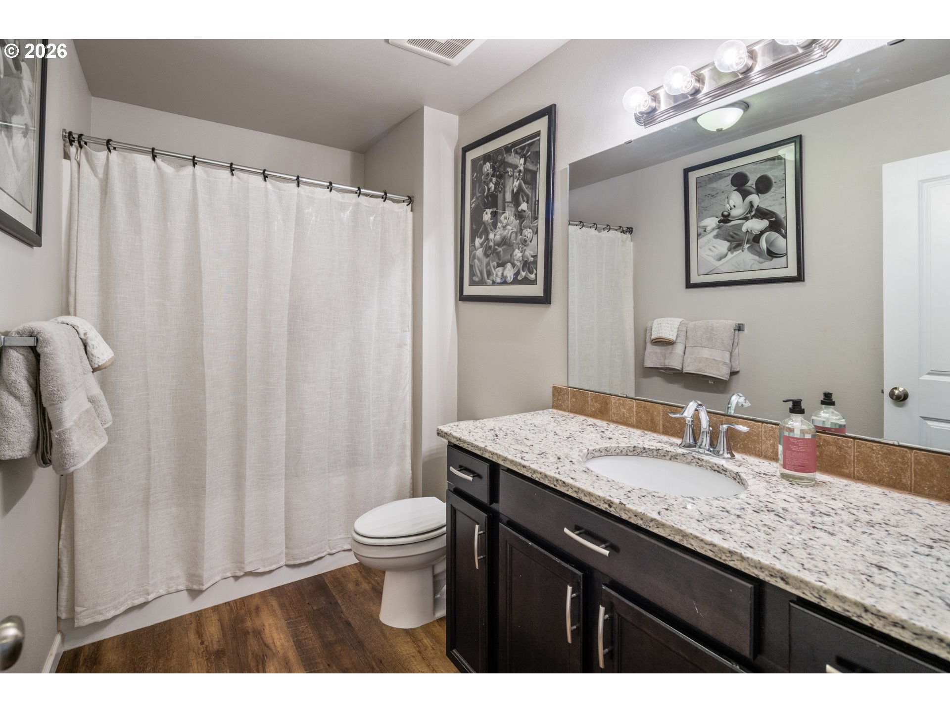 1452 Lacock-Kelchner Road Underwood, WA 98651 - Photo 24 of 40 a bathroom with a granite countertop sink mirror vanity and toilet