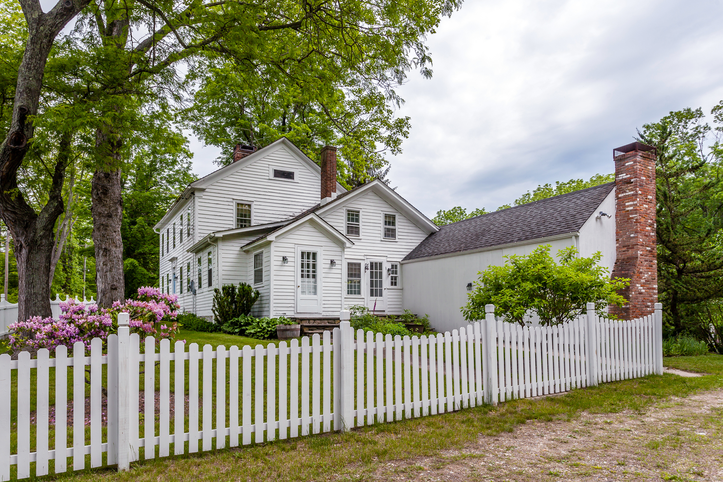 a front view of a house having yard