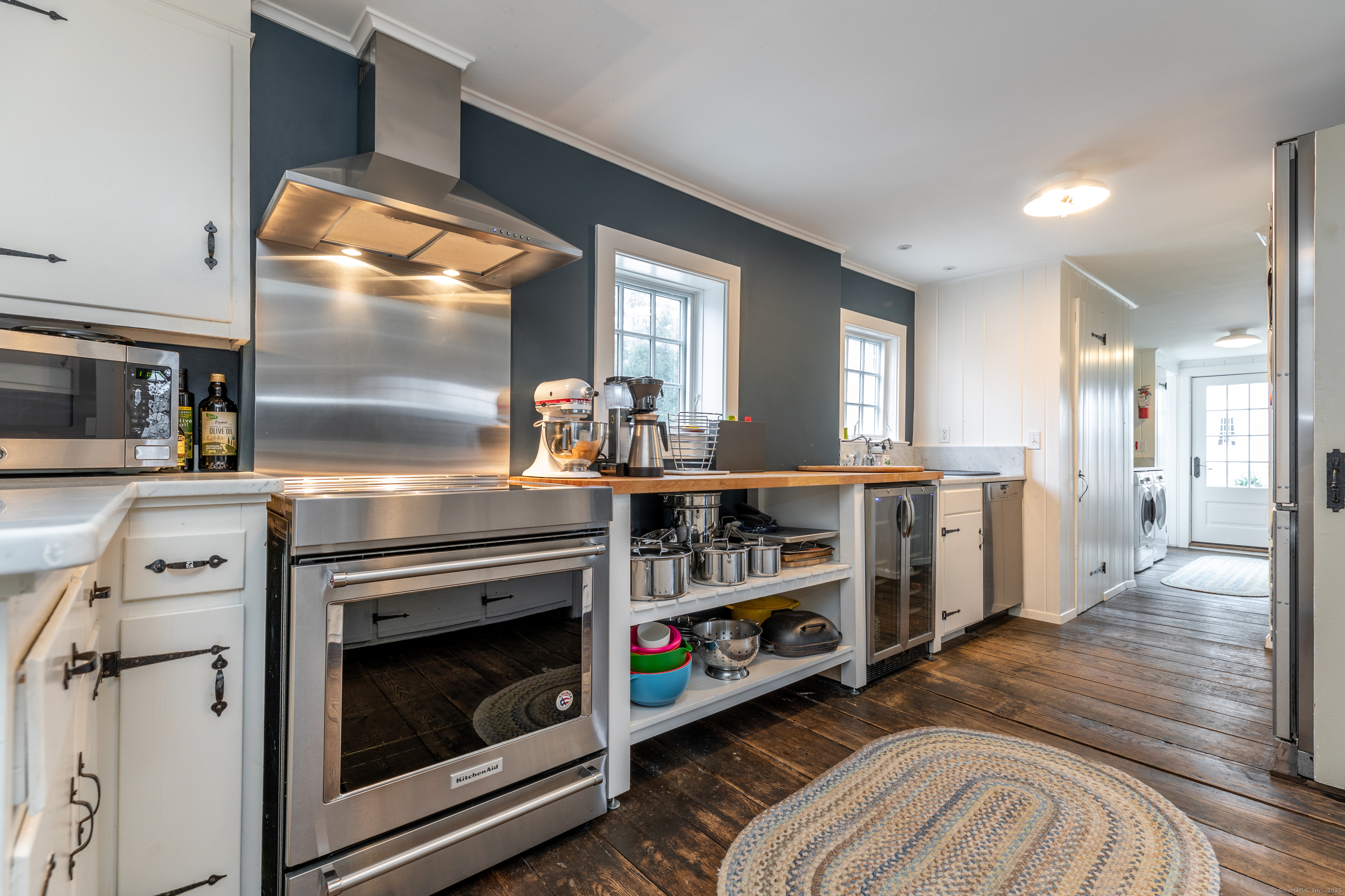 12 South Kent Road New Milford, CT 06755 - Photo 12 of 31 a kitchen with stainless steel appliances a stove and a refrigerator
