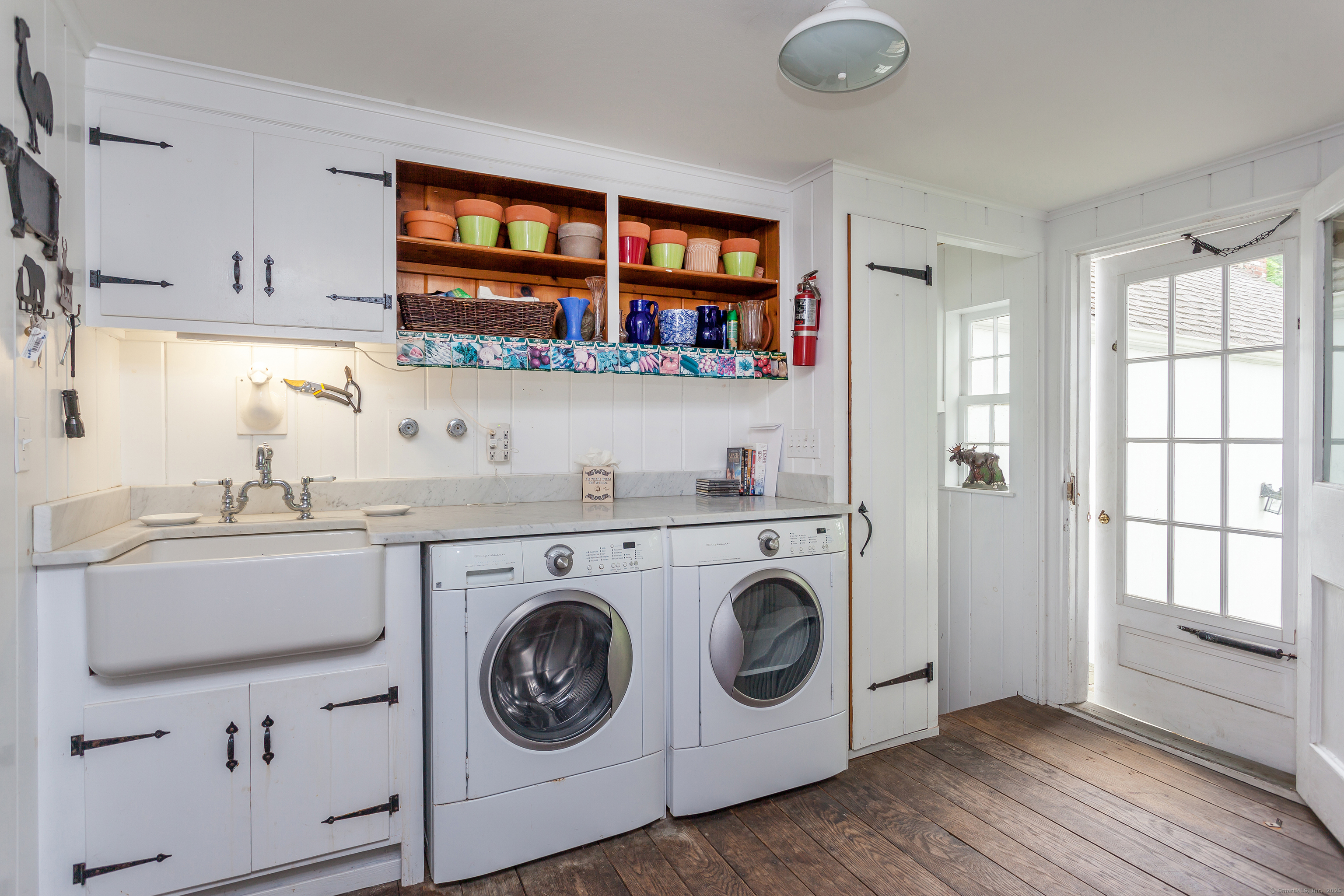 12 South Kent Road New Milford, CT 06755 - Photo 13 of 31 a utility room with sink dryer and washer