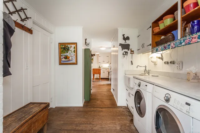 a view of hallway with washer and dryer