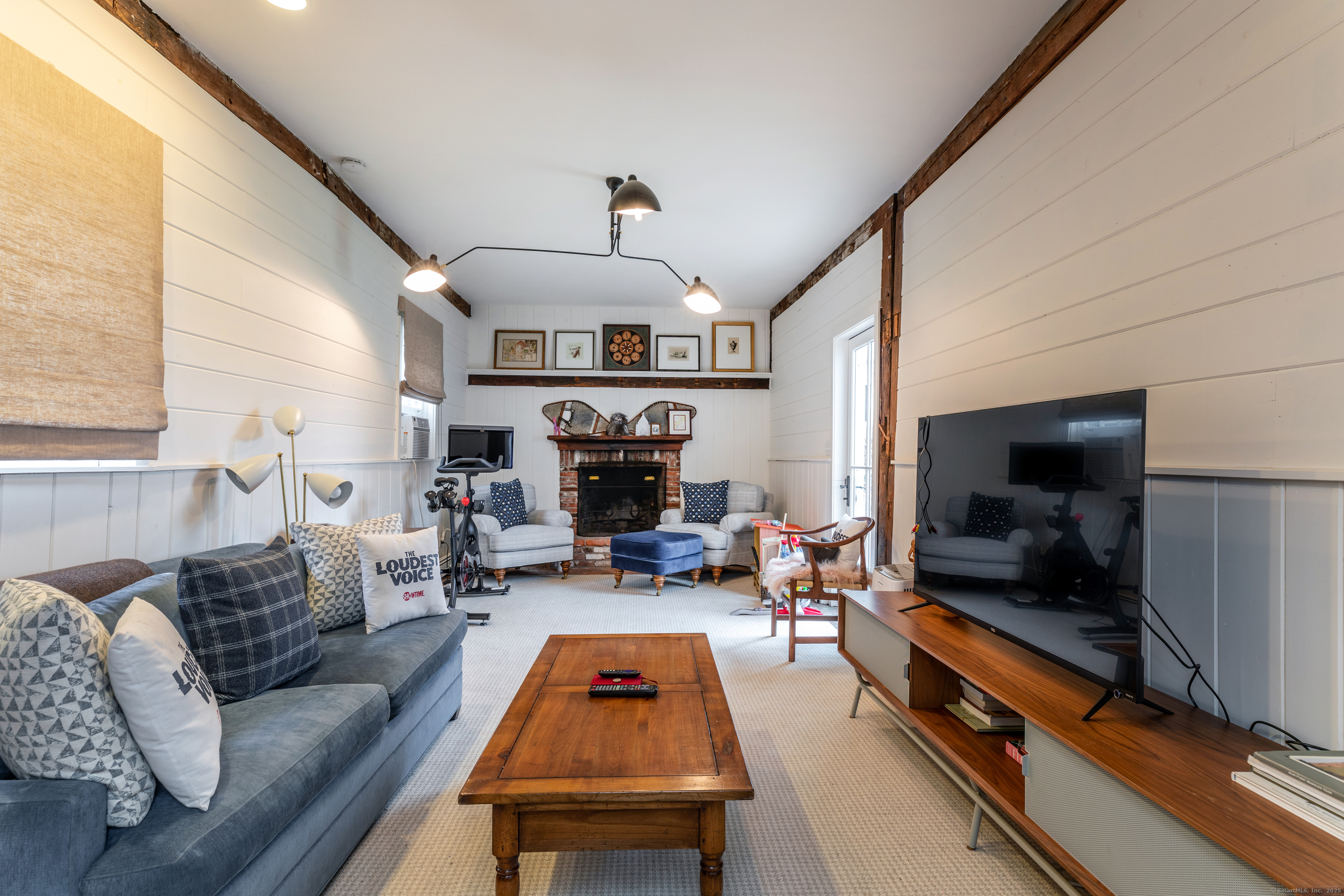 12 South Kent Road New Milford, CT 06755 - Photo 15 of 31 a living room with furniture and a flat screen tv