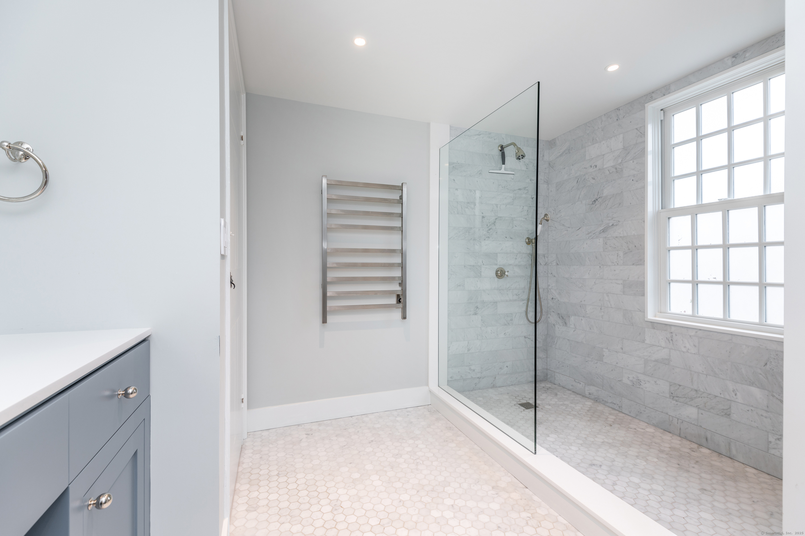 12 South Kent Road New Milford, CT 06755 - Photo 19 of 31 a bathroom with a shower and a window