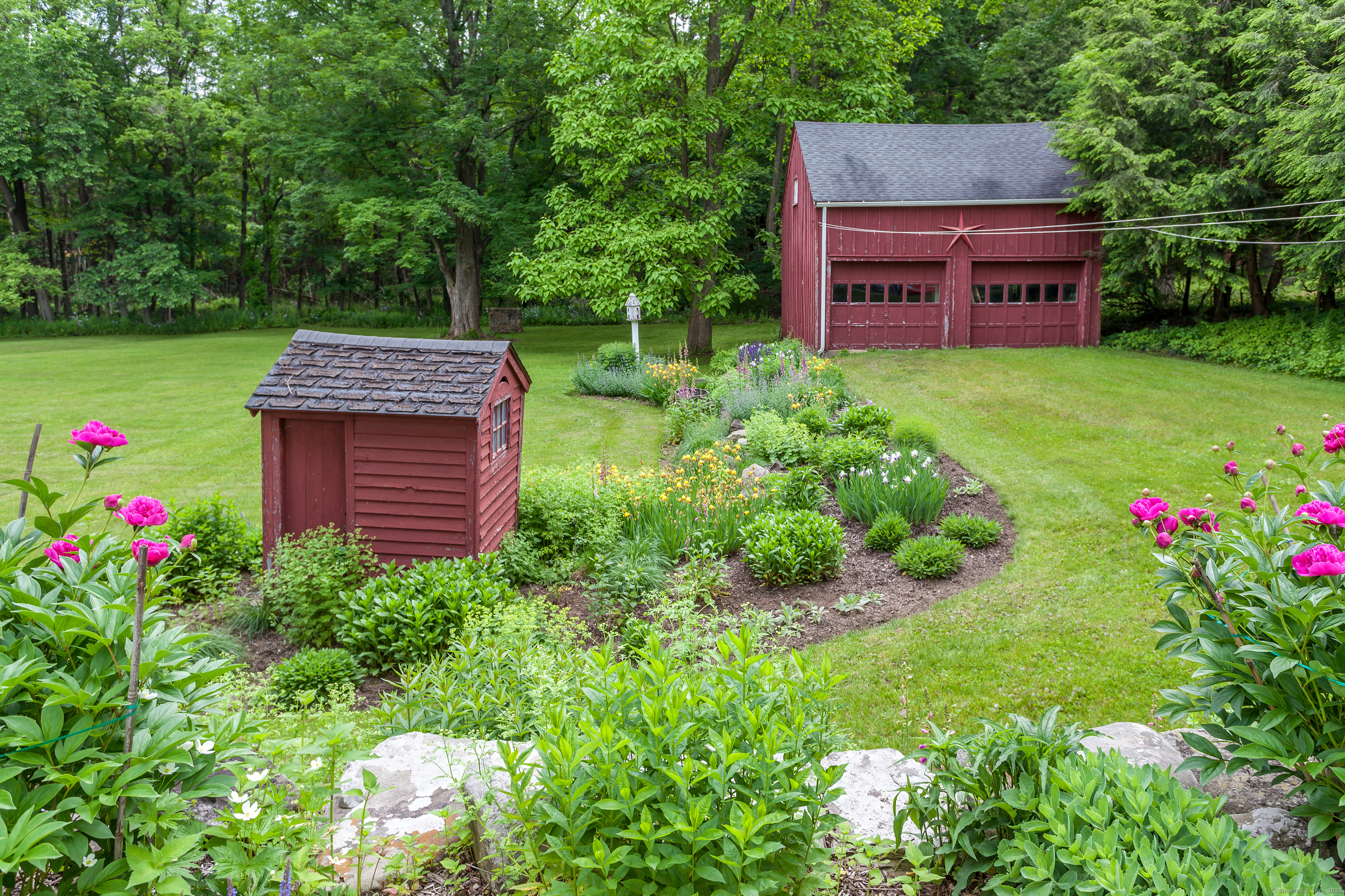12 South Kent Road New Milford, CT 06755 - Photo 28 of 31 a view of a chairs in a garden