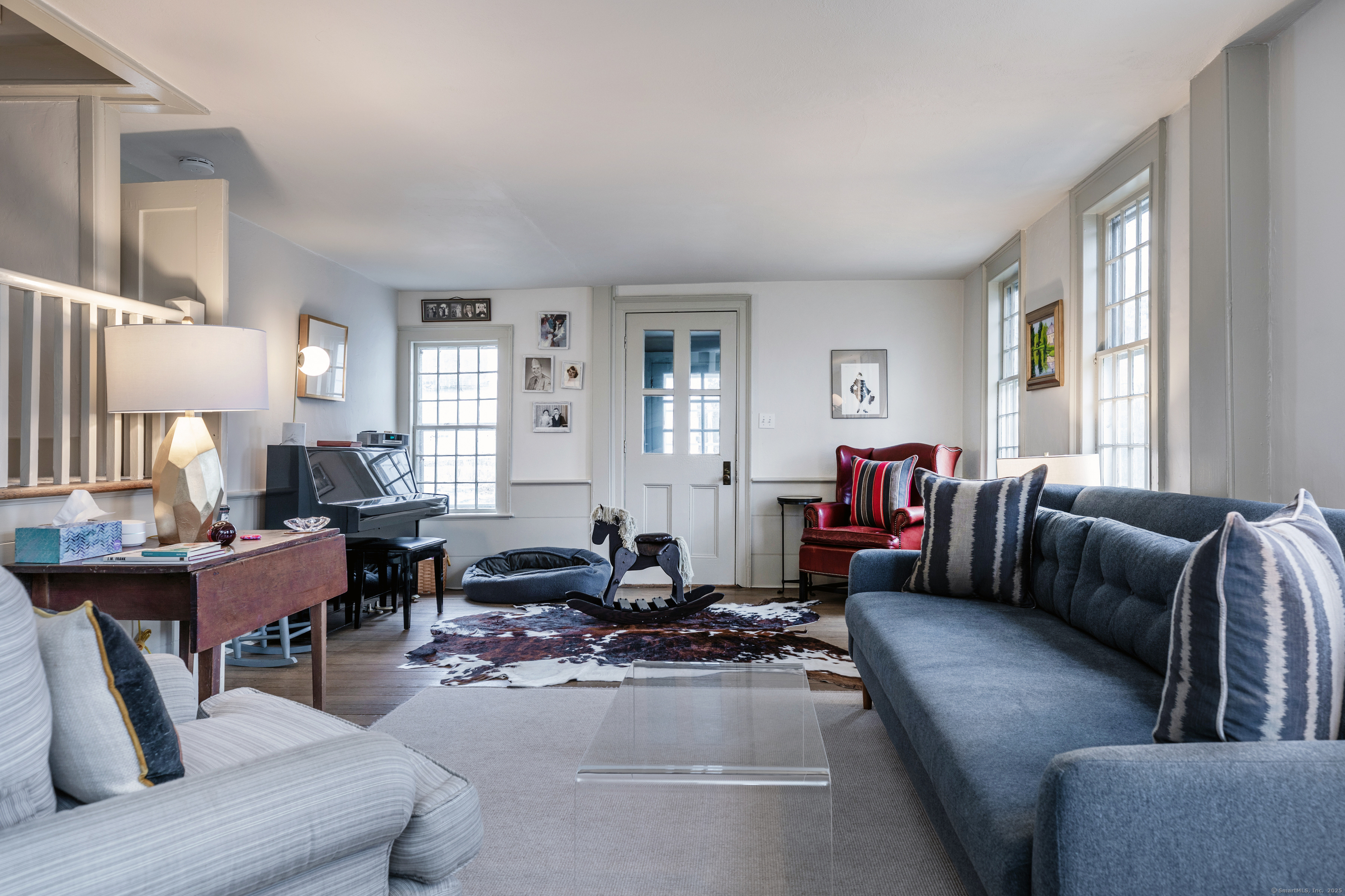 12 South Kent Road New Milford, CT 06755 - Photo 6 of 31 a living room with furniture and a large window