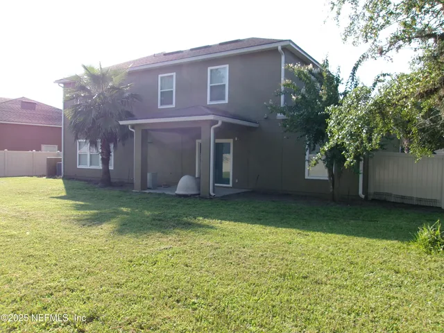 a view of outdoor space and yard
