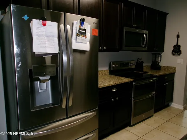 a room with gym equipment and a mirror