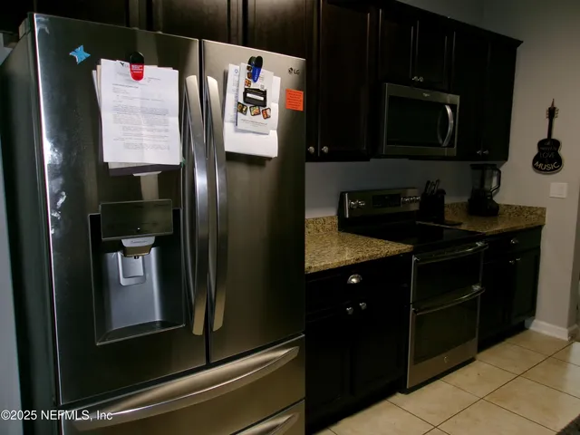 a room with gym equipment and a mirror