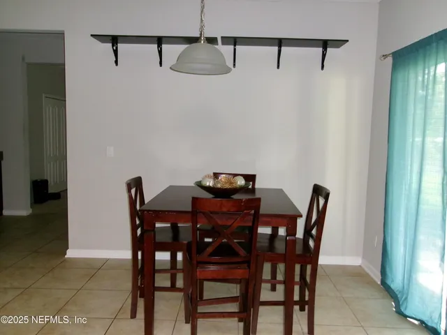 a white bath tub sitting next to a window