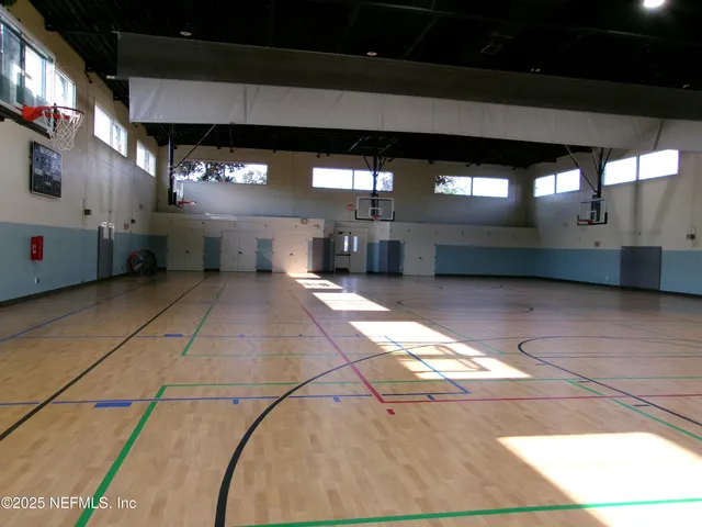 a view of a lake with houses in the back