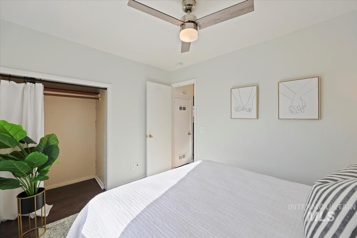 3111 West Palouse Street Boise, ID 83705 - Photo 23 of 32 Bedroom with ceiling fan, dark wood-style flooring, and a closet