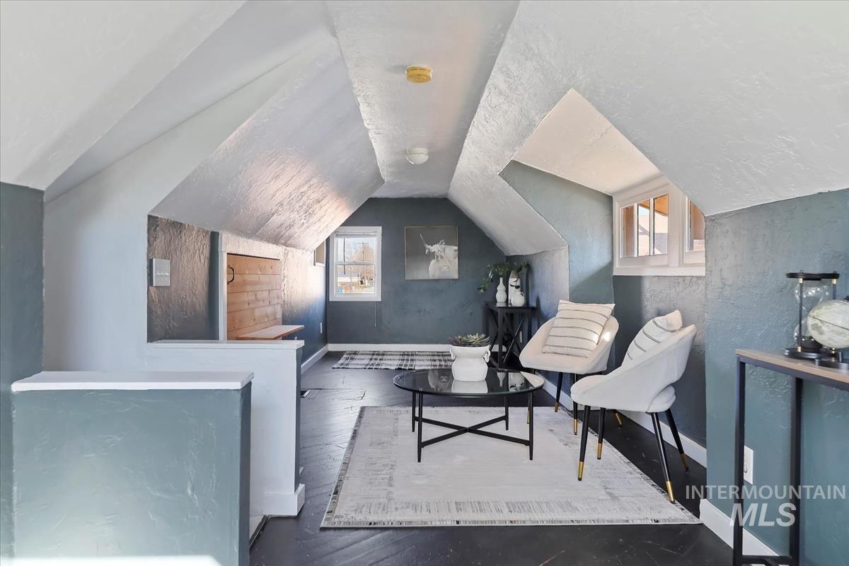 3111 West Palouse Street Boise, ID 83705 - Photo 24 of 32 Sitting room featuring vaulted ceiling and hardwood / wood-style floors