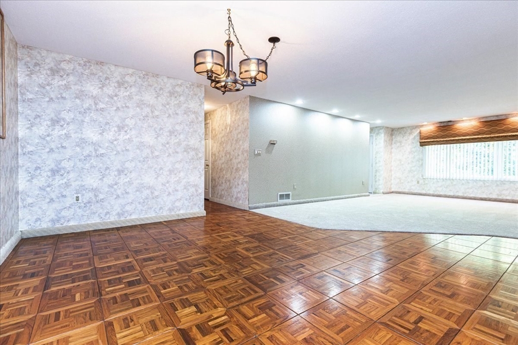 9 Ledgewood Way, Unit 9 Peabody, MA 01960 - Photo 11 of 42 a view of a livingroom with a flesh screen