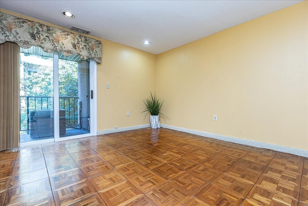 9 Ledgewood Way, Unit 9 Peabody, MA 01960 - Photo 25 of 42 a view of a big room with a window