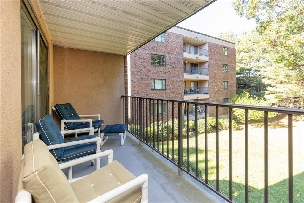 9 Ledgewood Way, Unit 9 Peabody, MA 01960 - Photo 34 of 42 a view of a chairs in the balcony