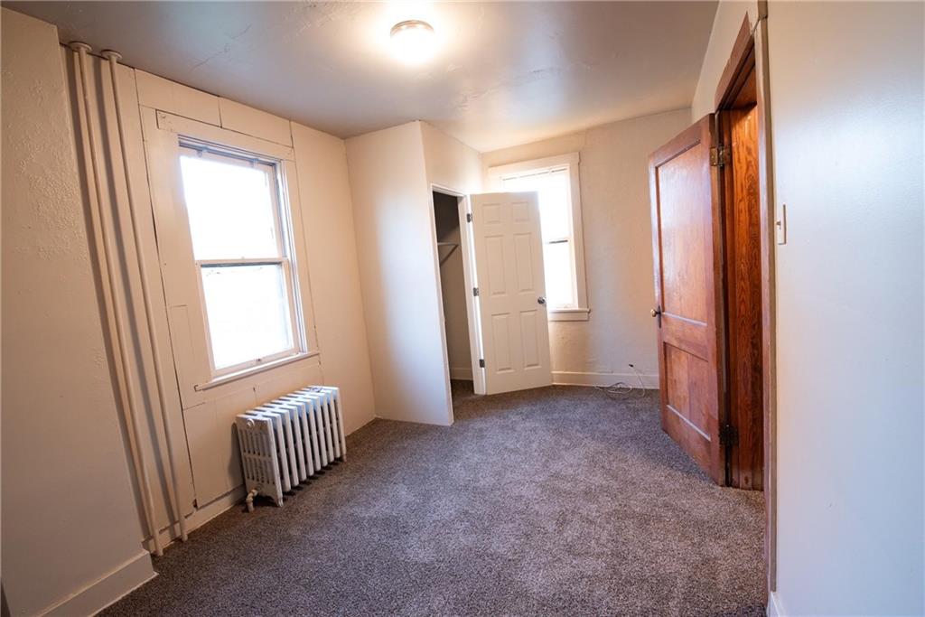 564 3rd Street Clairton, PA 15025 - Photo 12 of 20 an empty room with windows and closet