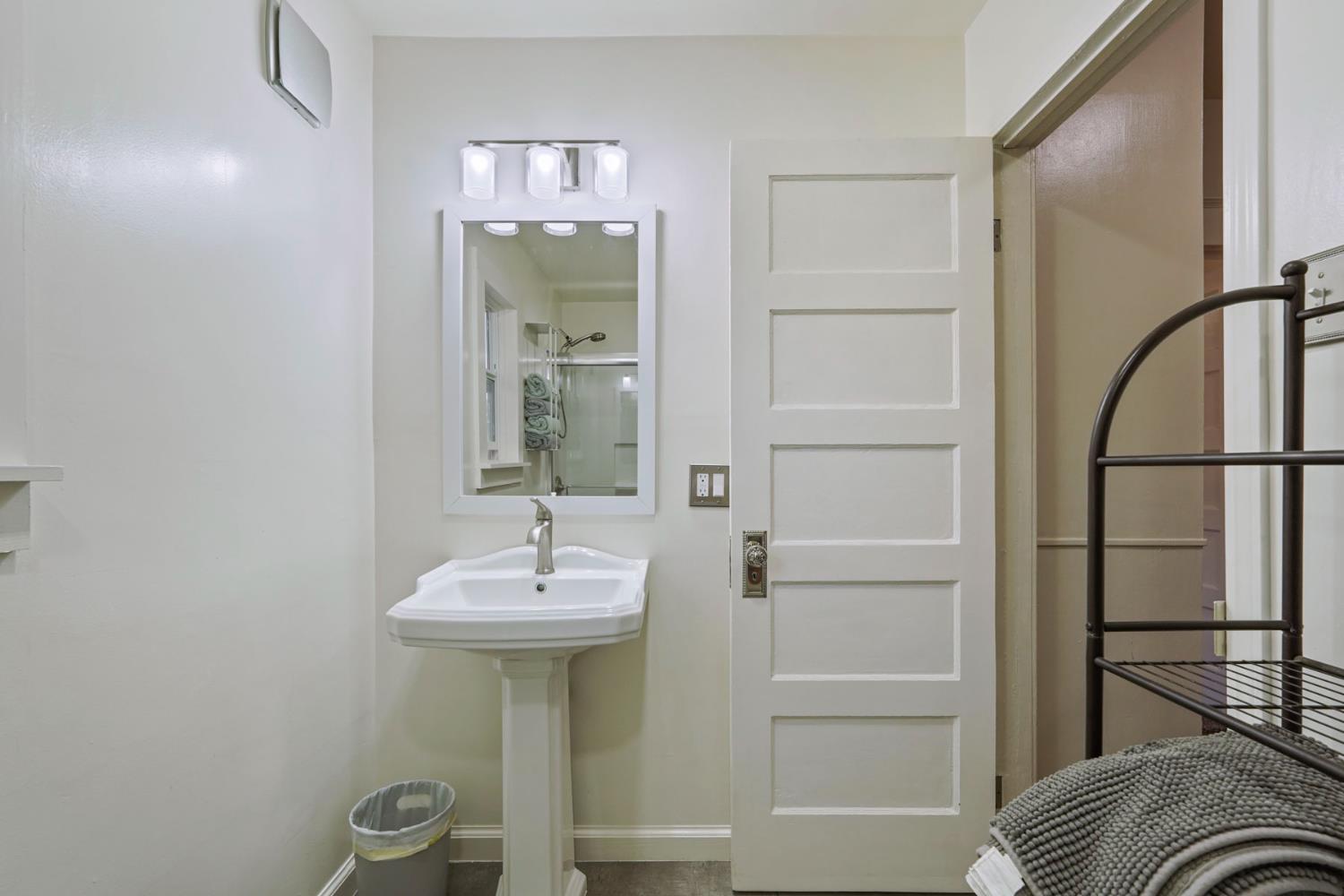 18529 Highway 88 Clements, CA 95237 - Photo 13 of 42 a bathroom with a sink and a mirror