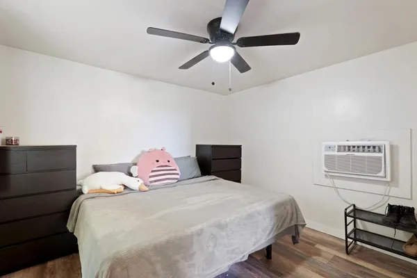 a view of a patio with table and chairs and potted plants