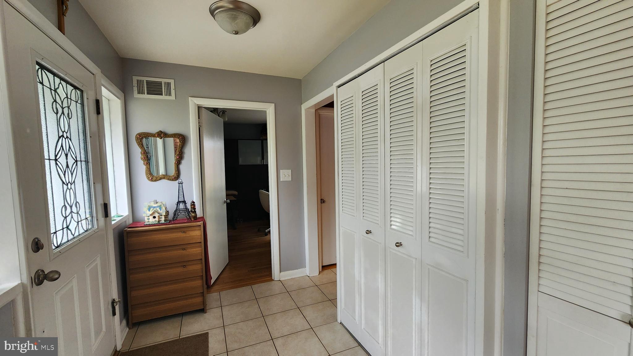 9429 Curran Road Silver Spring, MD 20901 - Photo 7 of 41 Spacious entry way w/main level laundry closet