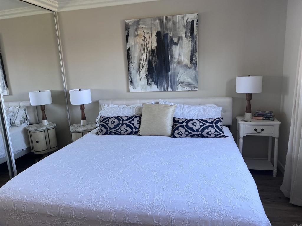 3589 Nina Street Oceanside, CA 92056 - Photo 11 of 33 a bedroom with a bed and wall painting on the wall