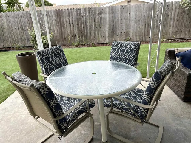 a view of outdoor space with seating area and furniture