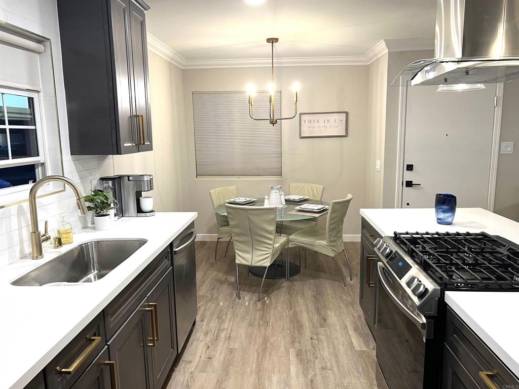 3589 Nina Street Oceanside, CA 92056 - Photo 2 of 33 a kitchen with a sink stove and cabinets