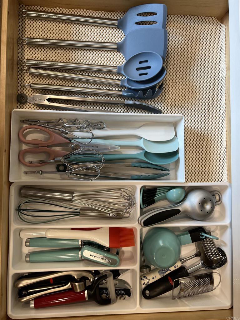 3589 Nina Street Oceanside, CA 92056 - Photo 31 of 33 a bathroom with a sink and a mirror