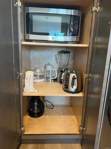 a close view of sink and cabinets