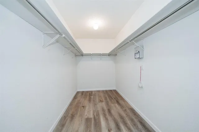 a bathroom with a sink a mirror and a bathtub