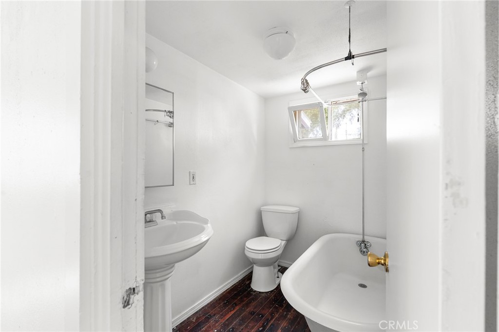 818 6th Street Corning, CA 96021 - Photo 15 of 32 a bathroom with a sink toilet and shower