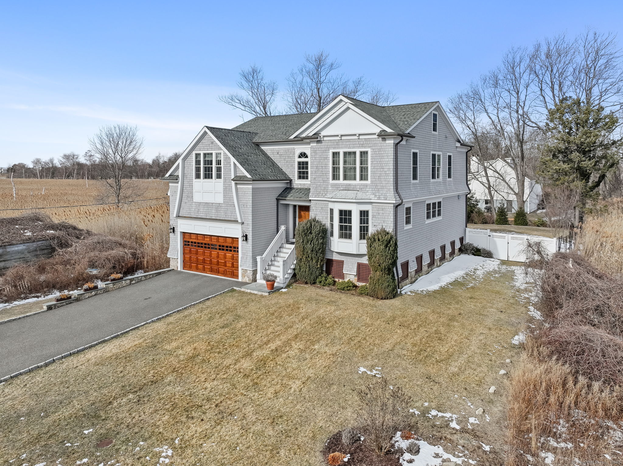 160 Old Dam Road Fairfield, CT 06824 - Photo 1 of 1 a front view of a house with a yard and garage